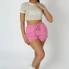 Kaiia CLOTHING TONAL EMBROIDERY ANGEL NUMBER HIGH WAISTED RUNNER SHORTS PINK