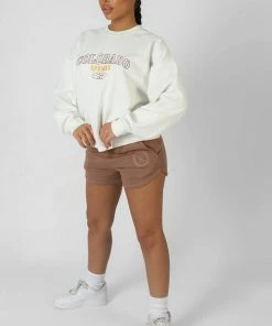 Kaiia EMBROIDERED CURVED HEM RUNNER SHORT TAN